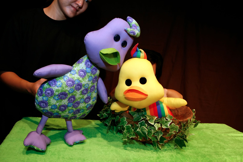 The duckie mummy and duckie in Duckie Can't Swim by Paper Monkey Theatre