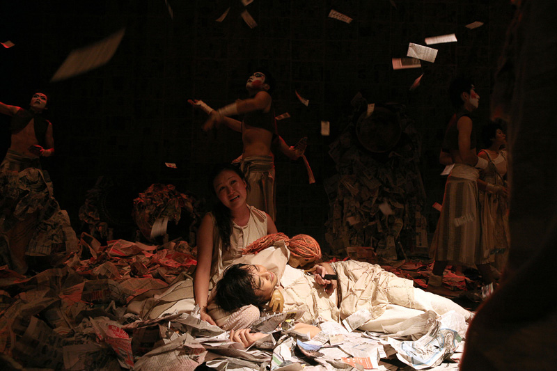 A man lying on the lap of a lady in Death of A Hero by Paper Monkey Theatre Singapore