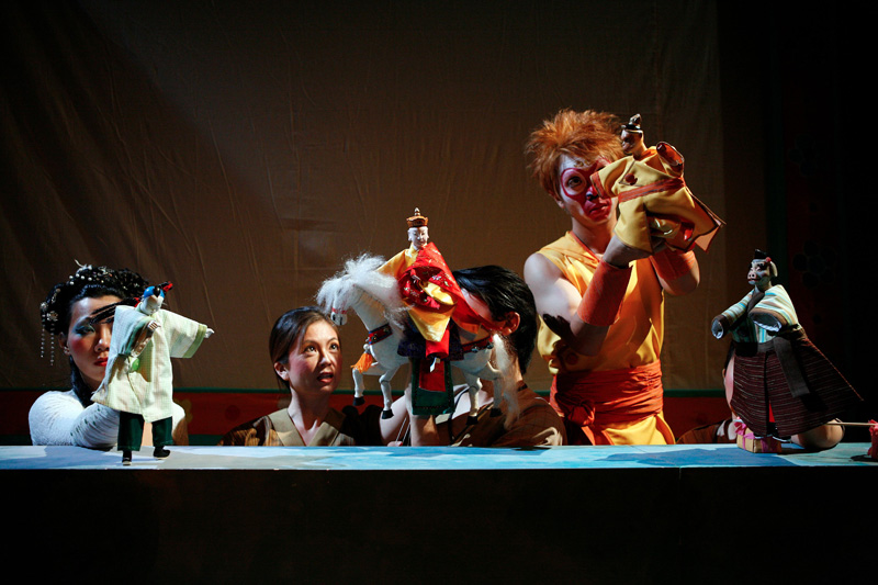 Hand puppets interacting on stage with Tang San Zang, Monkey King and Piggy