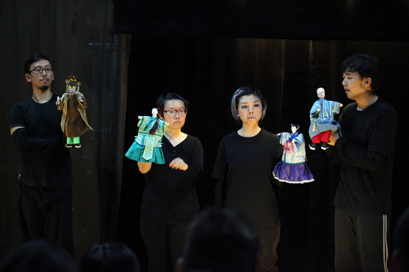 Four actors holding traditional hand puppets At Treehouse The Three Big Bullies by Paper Monkey Theatre
