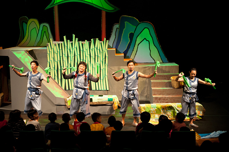 Four actors in movement Dragon Dance by Paper Monkey Theatre Singapore
