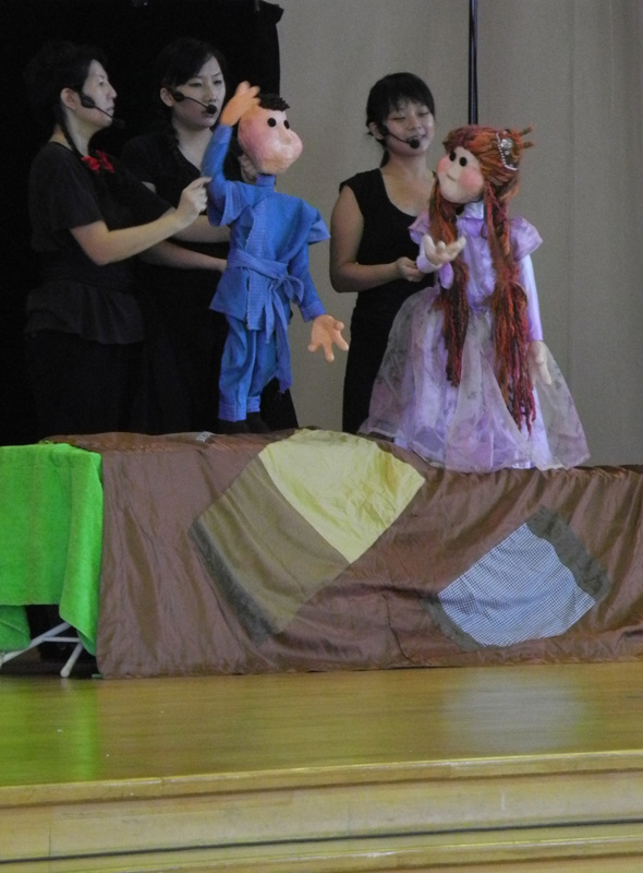 Life size princess and boy puppets in Dragon Dance Community Tour by Paper Monkey