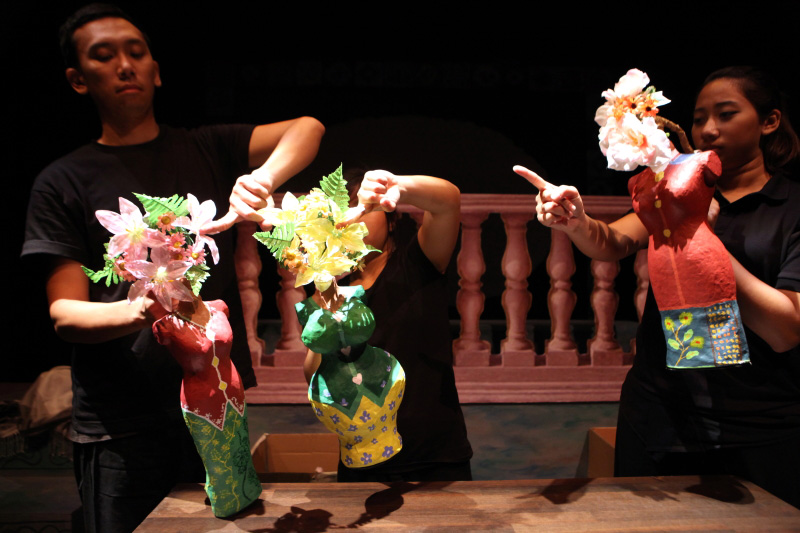 Three colourful Nonya puppets in action in The Nonya Nightingale by Paper Monkey Theatre Singapore