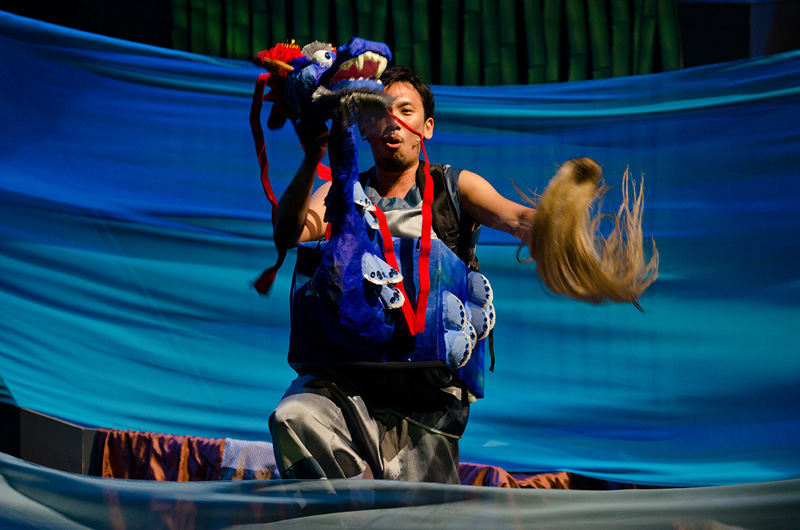 Blue dragon puppet in action in Dragon Dance by Paper Monkey Theatre Singapore