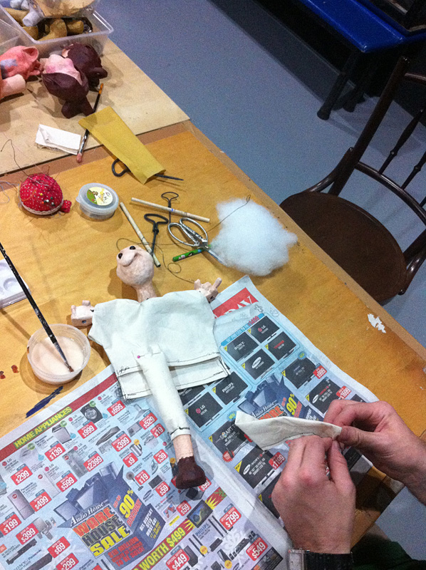 Close up of the process of making puppets with raw materials