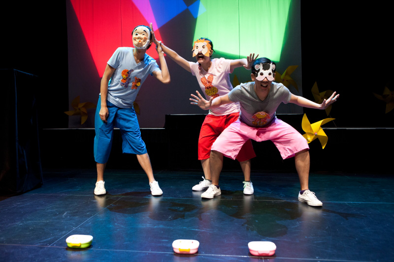 Three actors with masks in The Three Big Bullies by Paper Monkey Theatre Singapore