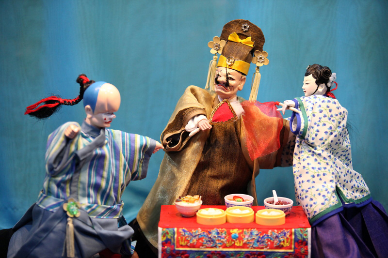 Traditional Chinese hand puppet and table prop At Treehouse The Three Big Bullies by Paper Monkey Theatre